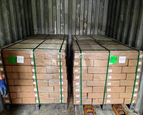 Cartons of magnets packed and ready for loading.