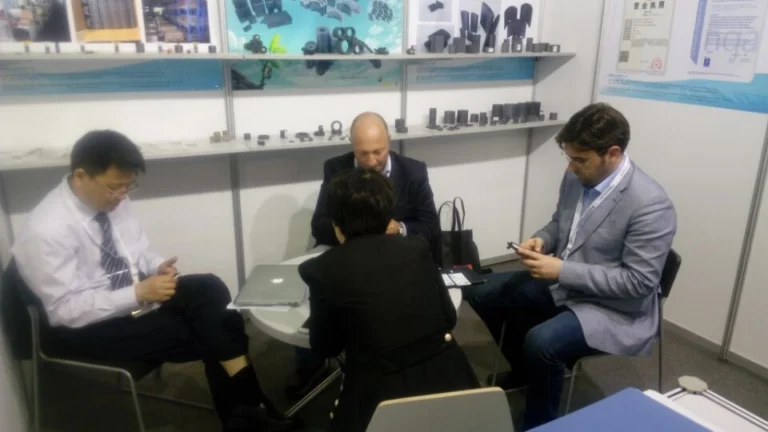 People discussing project documents with a customer.