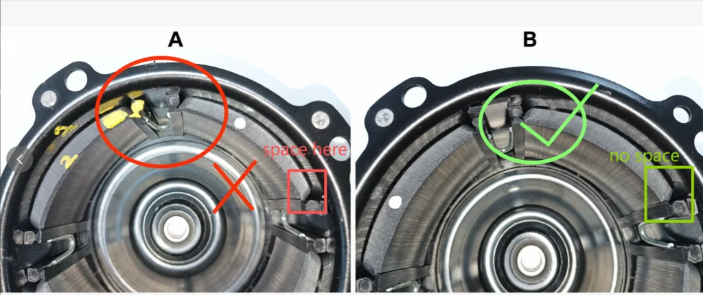 Ferrite arc magnet ends in an automotive axial fan motor assembly: the end as first supplied, and the end after the chamfer was increased to seat at the plastic clip holder for engagement by the U-shaped clip.